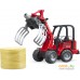 Игрушечный транспорт Bruder Schaffer Compact loader 2630 with bale gripper + bale 02192. Фото №6